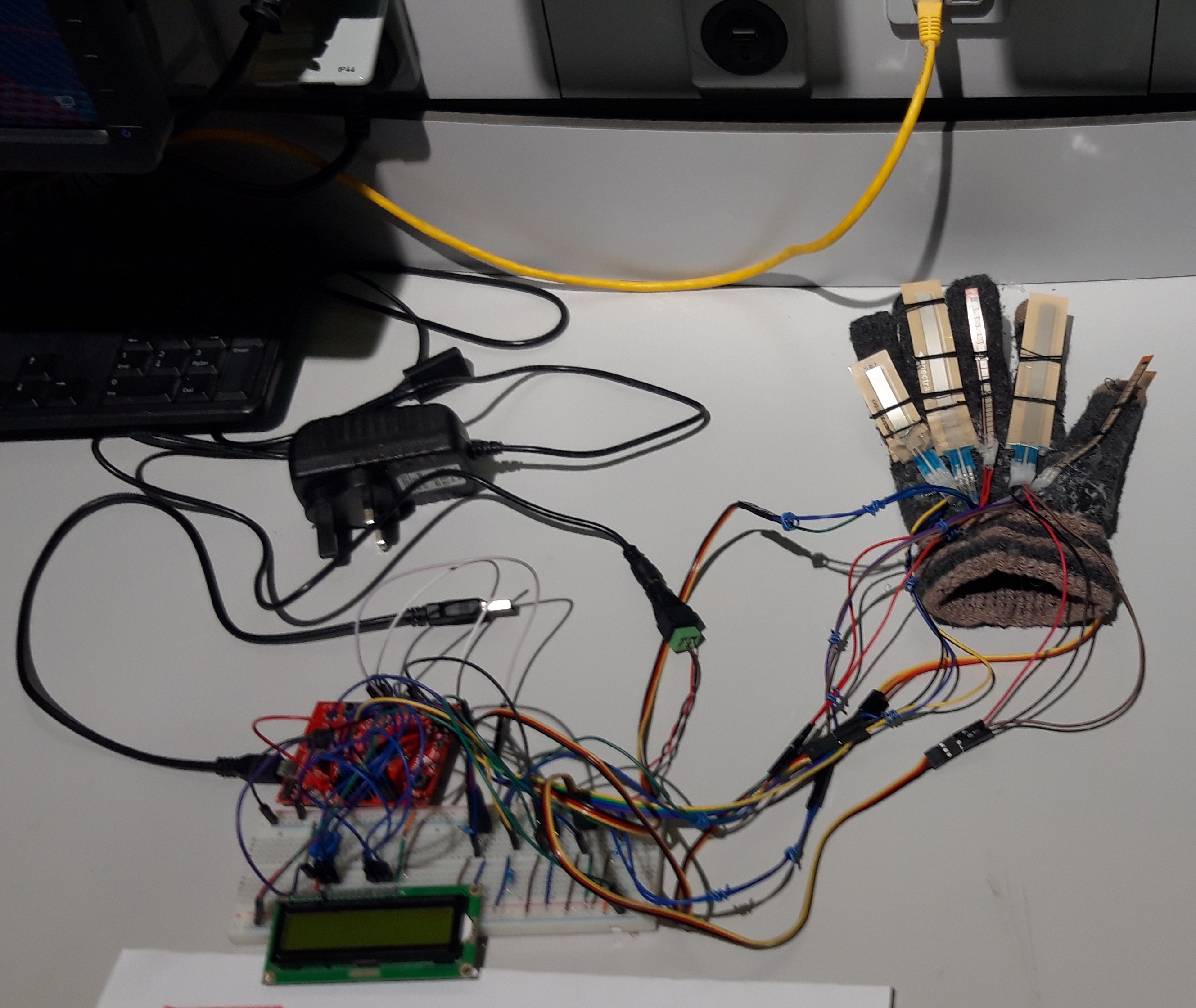 Sensor glove and electronics for the ASL Automated Interpreter